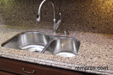 quartz-kitchen-countertop-with-quartz-backsplash-and-undermount-sink
